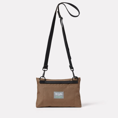 Herb Travel Cycle Crossbody Bag in Silt