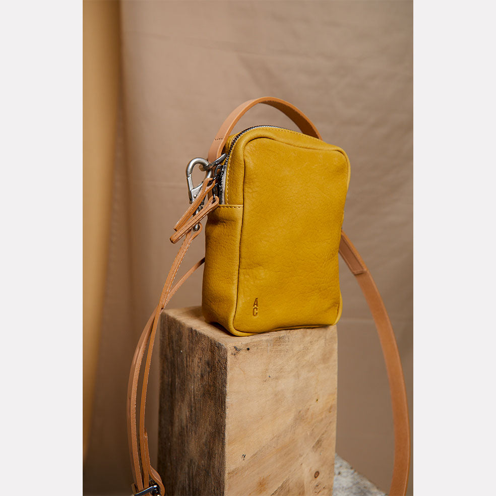 Hurley Calvert Leather Crossbody Bag in Yellow Ally Capellino